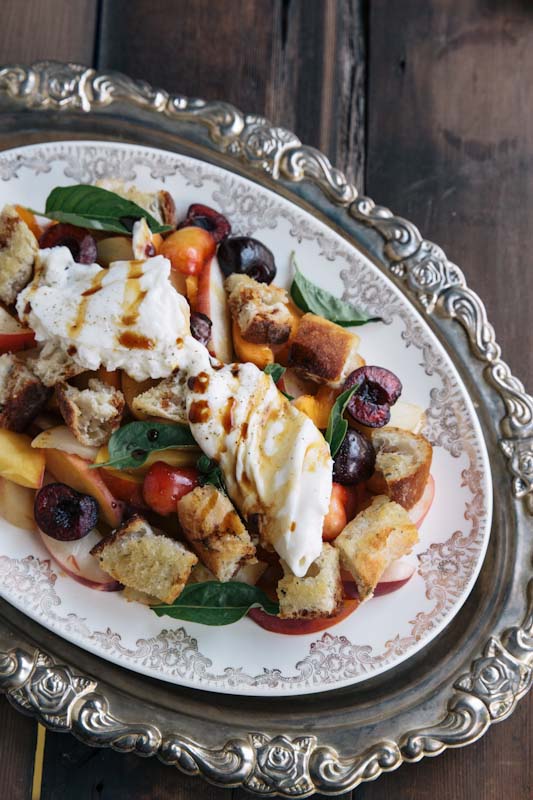 A dreamy summer fruit salad topped with creamy burrata cheese • theVintageMixer.com 