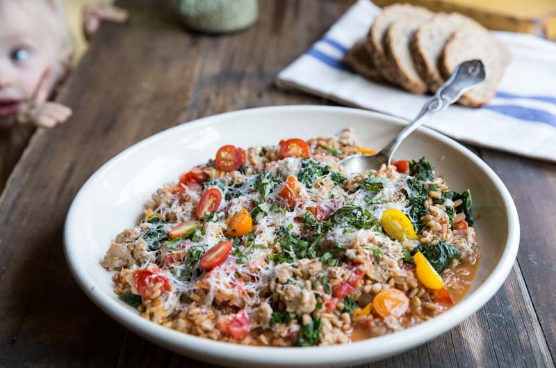 One-Pan Farro with Tomatoes, Sausage and Kale • theVintageMixer.com #eatseasonal