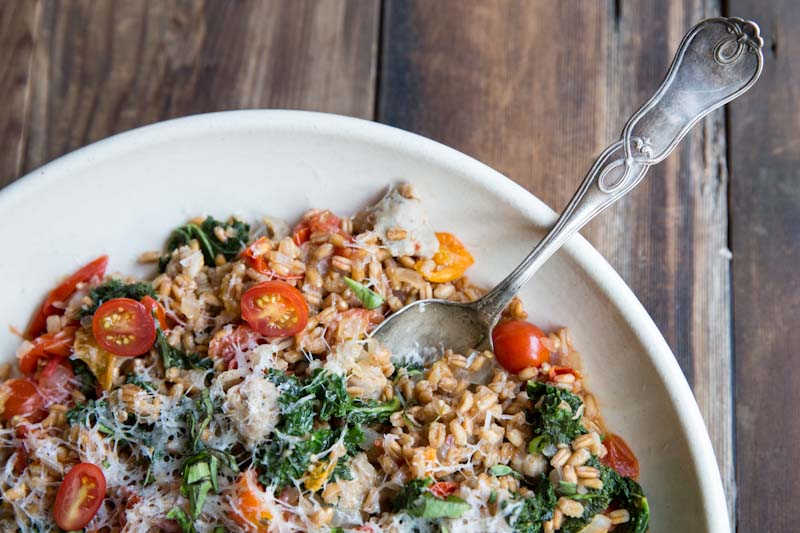 One-Pan Farro with Tomatoes, Sausage and Kale • theVintageMixer.com #eatseasonal