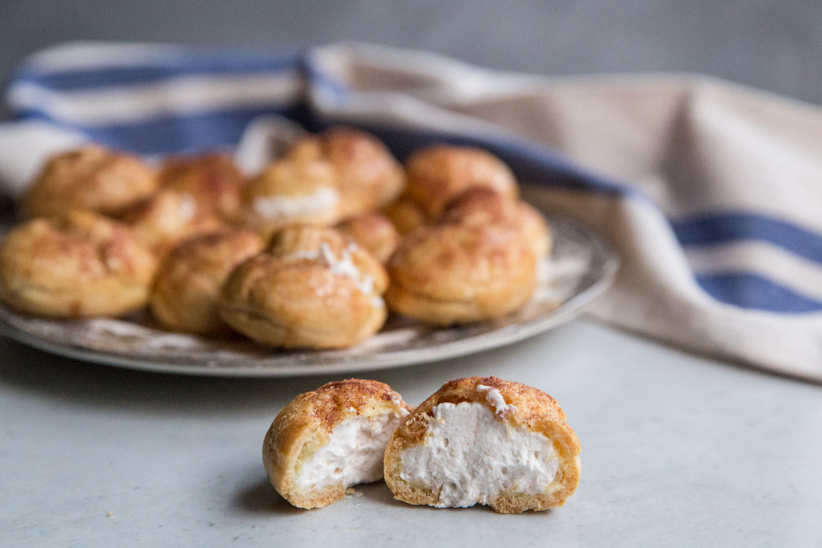 Churro Cream Puffs Recipe • theVintageMixer.com #churros #pateachoux