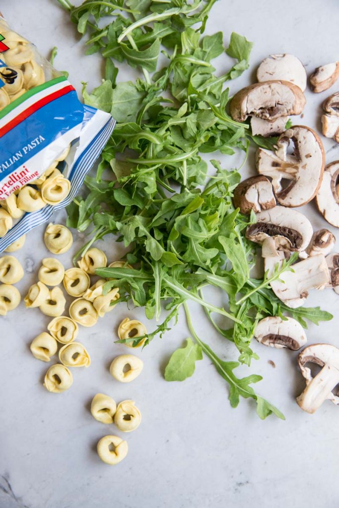 Mushroom Arugula Pasta Salad Recipe • theVintageMixer.com #pastasalad #mushrooms #eatseasonal #cleaneating