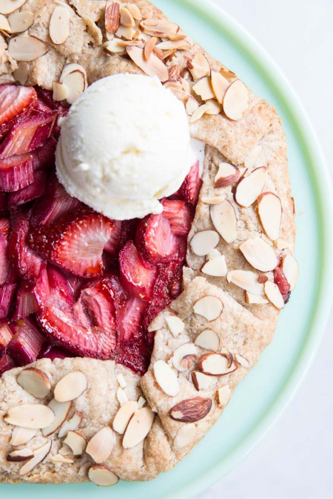 Strawberry Rhubarb Almond Galette • theVintageMixer.com #galette #strawberryrhubarb #summerdessert #fruitdessert