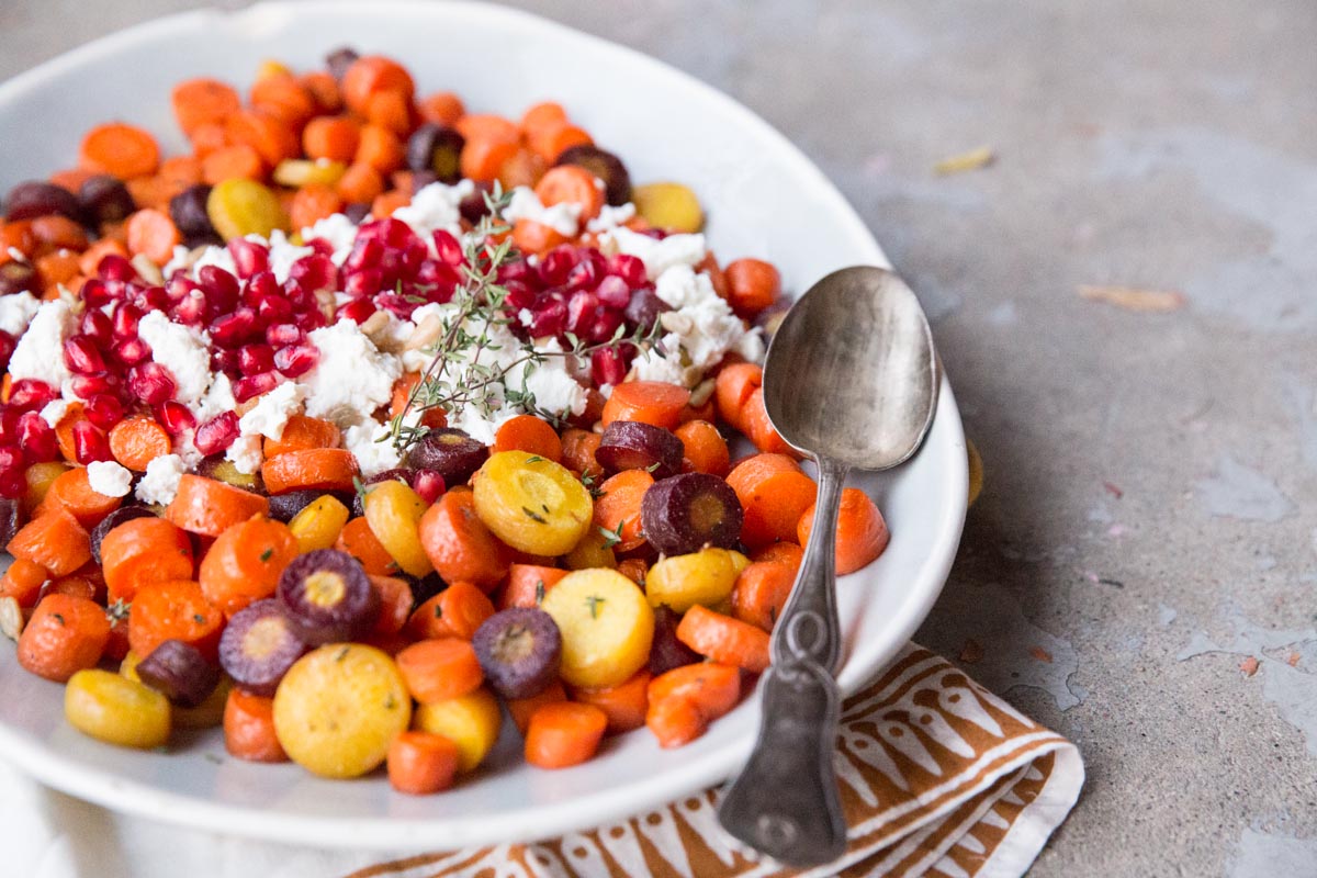 Honey Roasted Carrots with Pomegranate Seeds and Goat Cheese • theVintageMixer.com #sidedish #carrots #myharmons #thanksgivingrecipe