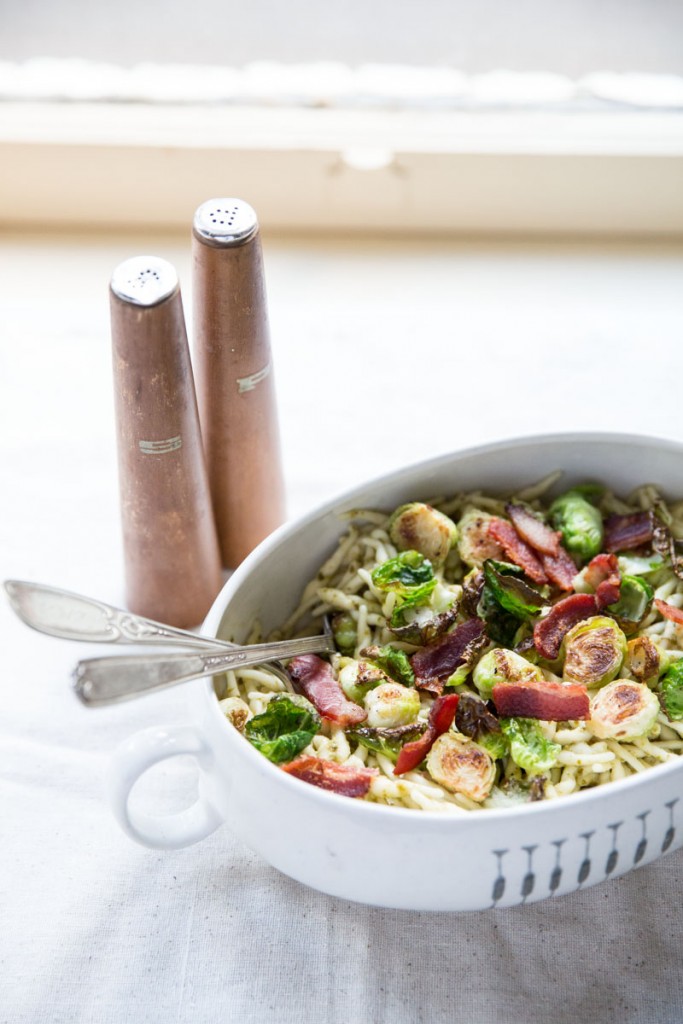 Pesto Trofie Pasta with Brussels Sprout Chips and Bacon • theVintageMixer.com #pasta #brusselssprouts #bacon #eatseasonal