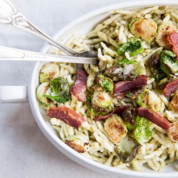 Pesto Trofie Pasta with Brussels Sprout Chips and Bacon • theVintageMixer.com #pasta #brusselssprouts #bacon #eatseasonal