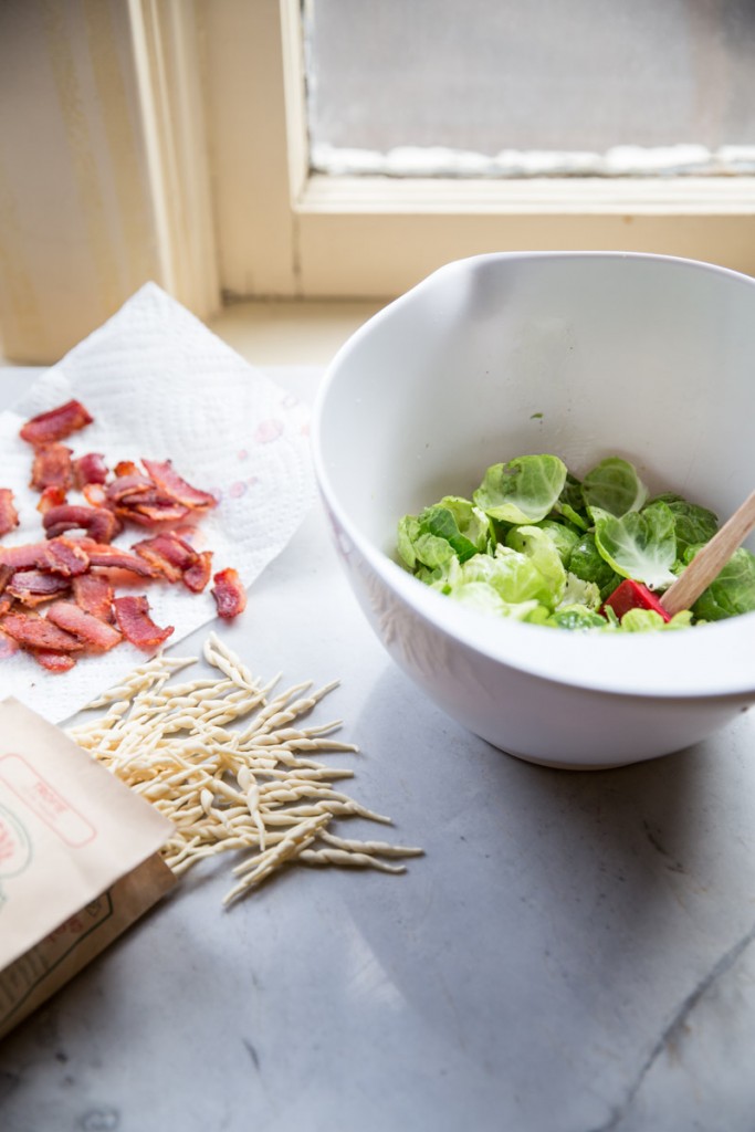 Pesto Trofie Pasta with Brussels Sprout Chips and Bacon • theVintageMixer.com #pasta #brusselssprouts #bacon #eatseasonal