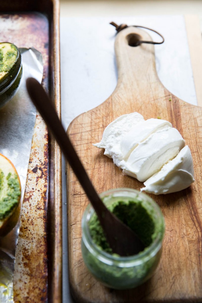 Stuffed Acorn Squash with Burrata Pesto and Greens • theVintageMixer.com #acornsquash #buratta #sidedishrecipe