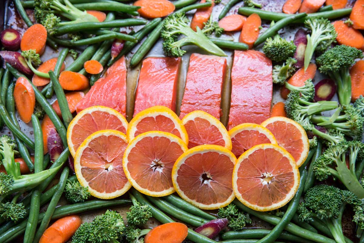 Orange Sesame Sheet Pan Salmon Recipe • theVintageMixer.com #salmonrecipe #sheetpanrecipe #easyrecipe #healthyrecipe #glutenfree #dairyfree #myharmons