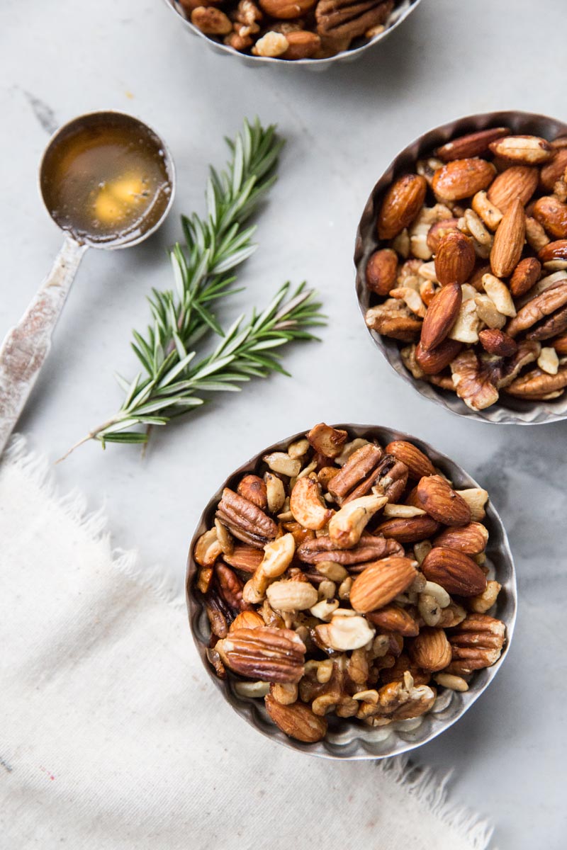 Rosemary and Honey Spiced Nuts Recipe • theVintageMixer.com #motheremoment #roastednuts #spicednuts #essentialoilrecipe