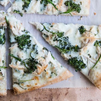 Broccoli Rabe and Chicken Pizza with Basil Cream Sauce • theVintageMixer.com #eatseasonal #pizzarecipe #chickenrecipe