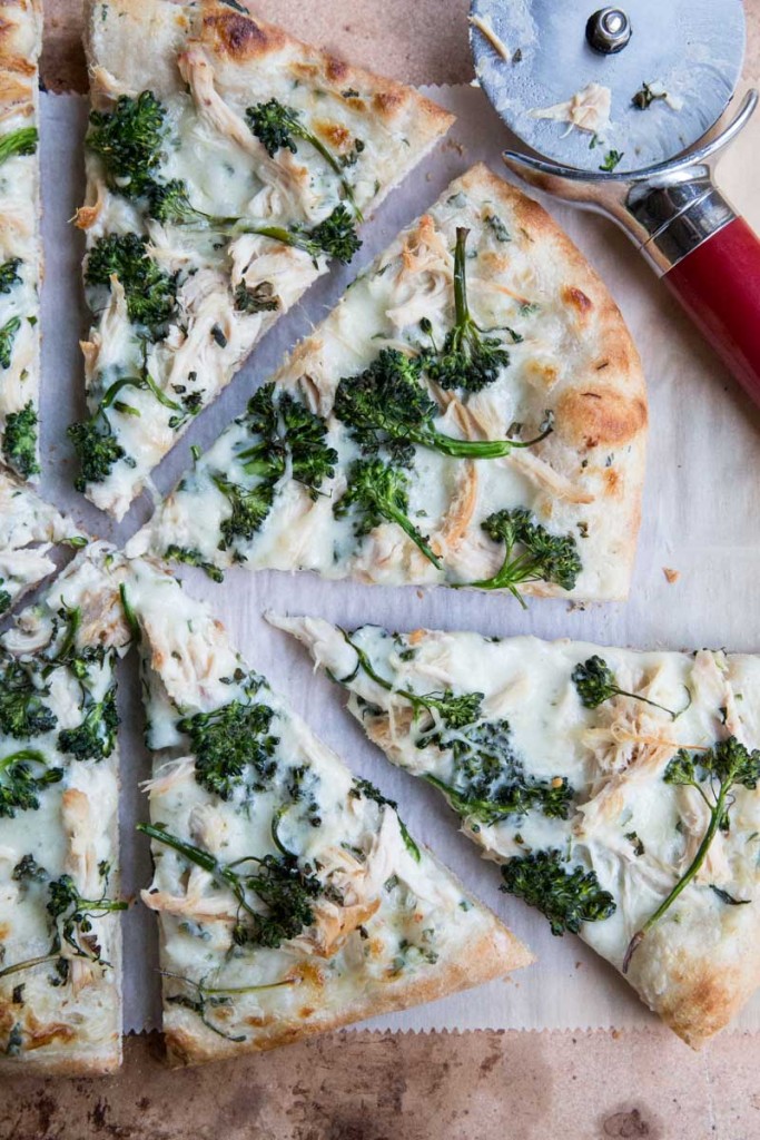 Broccoli Rabe and Chicken Pizza with Basil Cream Sauce • theVintageMixer.com #eatseasonal #pizzarecipe #chickenrecipe