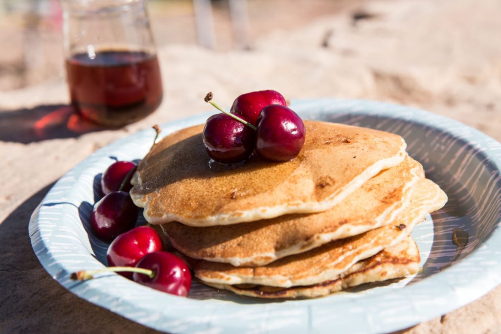 You're going to want these hearty pancakes loaded with fresh fruit and nuts for your next camping trip.