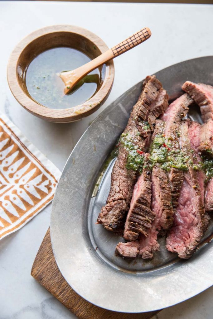 This recipe for Flank Steak with Chimichurri gives away all of the best secrets to cooking a perfect steak.