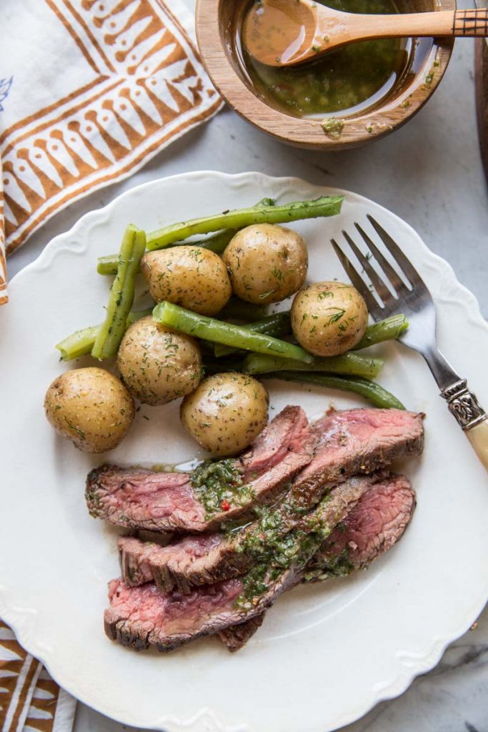 Here's a simple Summer meal of that's fool-proof, Flank Steak with Chimichurri.