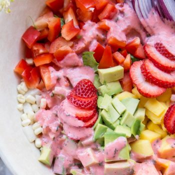 The Perfect Summer Salad with tons of chopped veggies and a strawberry lime dressing