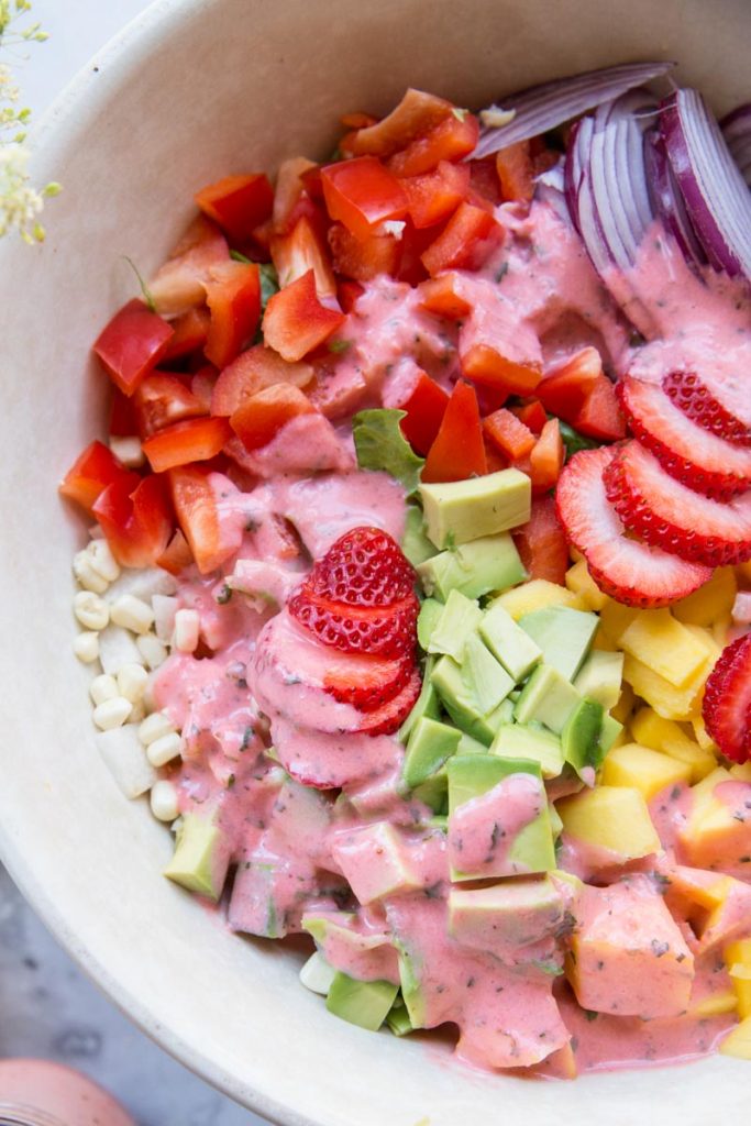 The Perfect Summer Salad with tons of chopped veggies and a strawberry lime dressing