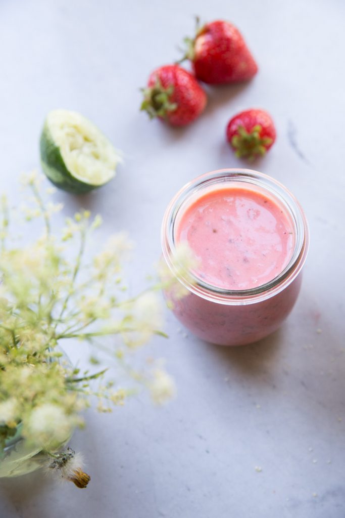 This Strawberry Lime Salad Dressing made creamy with Greek Yogurt is a must try this Summer!