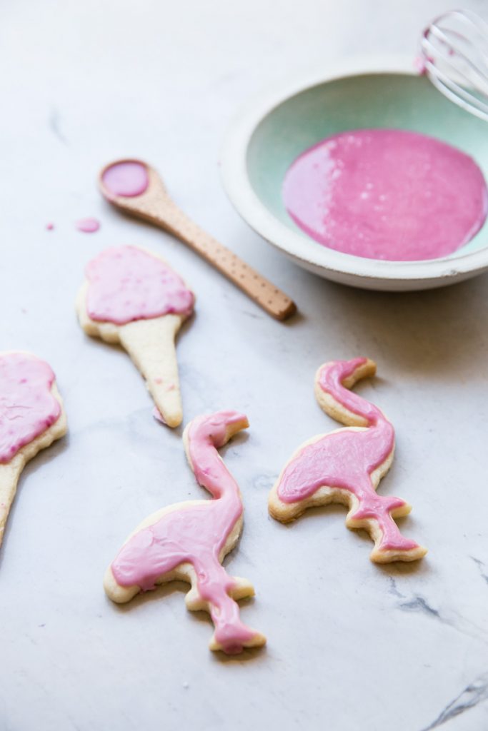 Check out this super fun idea to make Summer Cut Out Cookies with flamingoes and ice cream cones using natural food coloring. 