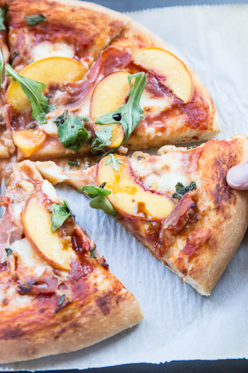 There's never a slice left of this Peach and Prosciutto Pizza when we make it at home.