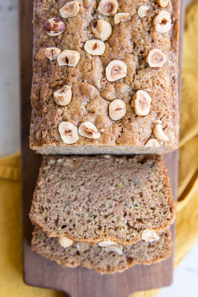 My family can't get enough of this healthy zucchini bread topped with toasted hazelnuts. 