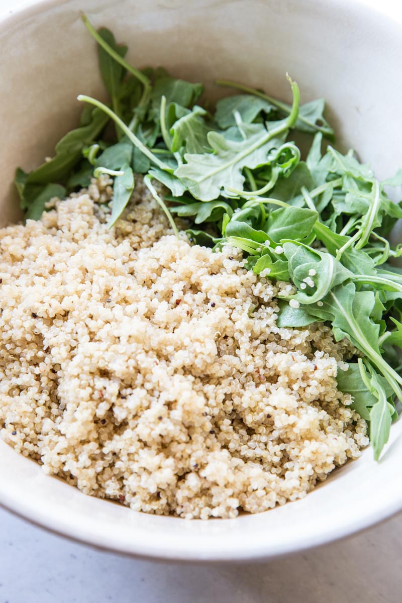 Quinoa and Arugula make up the base for this super flavorful Mediterranean Quinoa Salad. 