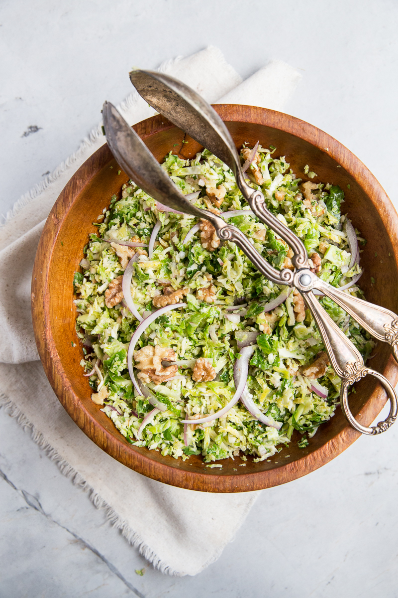 This raw Shredded Brussels Sprout Salad Recipe is a crowd pleaser for holiday gatherings or to accompany a wintery stew or casserole. 