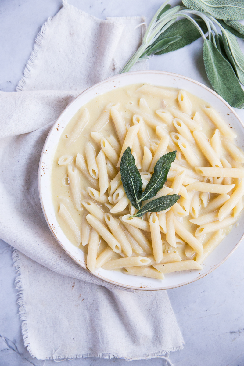 We make a big batch of this Vegan Pumpkin Alfredo Pasta Sauce and freeze it in portions for a quick and healthy family meal (way better for you than mac and cheese)!