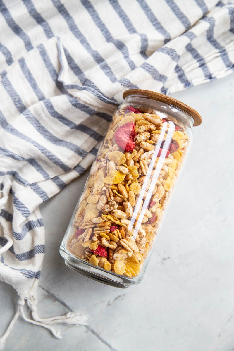 This homemade cereal recipe is not only healthier with less sugar that the cereal at the supermarket but it's also cheaper and way easy to make. 