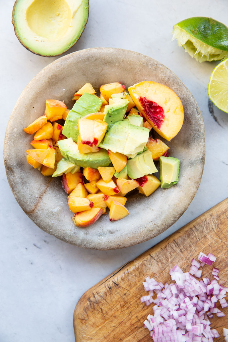 An easy recipe for peach and avocado salsa that goes great with just about any Mexican dish.